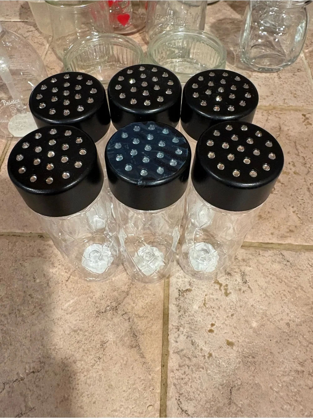 Set of 6 plastic spice holders with black, sparkly lids, 3 glass holders w/lids